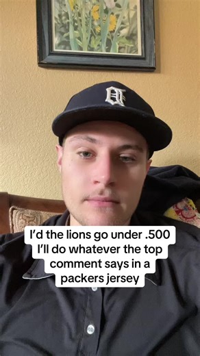 Detroit Lions Fan Challenges Himself with Packers Jersey