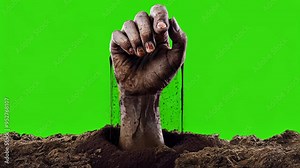 zombie hand coming out of grave over green screen Stock Video