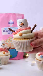 Get ready to sleigh the festive season with these adorable Christmas snowmen cupcakes! ☃️ For the snowmen decorations, you'll need: - Silver Spoon Vanilla Flavoured Icing Sugar - White marshmallows (for the head) - Edible black pen (for the eyes and mouth) - Orange sprinkle (for the nose) - Smartie or M&Ms (for the buttons) - Mikado sticks (for the arms) Method for decorating: 1. Fit a piping bag with a large round nozzle and fill with the buttercream. 2. Starting from the outside edge, pipe a s