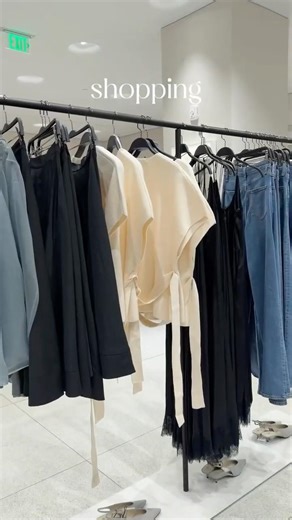 buying new clothes at the mall.
