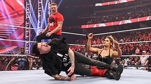 Beth Phoenix hits Dominik Mysterio with the Glam Slam