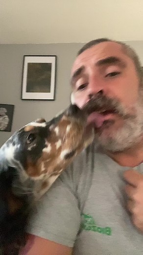 Affectionate Moments Between Man and Dog