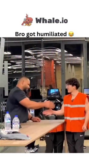 @relatable__sarcasm.k on Instagram: "- The post shares a 18-second gym video where a smaller man in an orange vest quickly overpowers a larger, muscular opponent in an arm-wrestling grip challenge, captioned “Bro got humiliated 😂,” garnering 21k likes and 946k views since December 16, 2025. - Replies split on technique, with some accusing the winner of cheating by using body weight and off-hand leverage against the table, while others praise it as evidence of functional “regard strength” from m