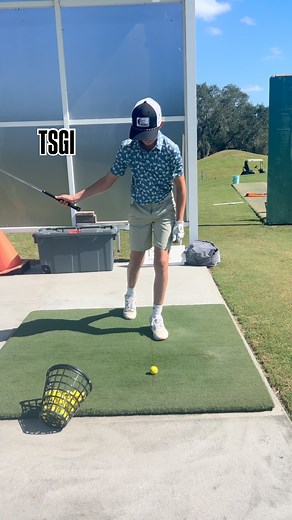 TSGI- Jack demonstrating right arm only - left foot forward in a staggered stance to help get arm swing and more body stability | Tim Sheredy Golf Institute
