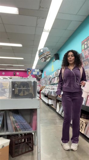 wearing a juicy track suit and roaming a vinyl store (my early 2000s dream)