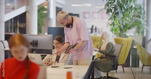 A diverse group of colleagues collaborates in modern offices, showcasing their collective problem-solving skills and innovative approach to address a variety of business challenges.