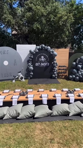 This gym-themed first birthday party is absolutely adorable. 🦾🎈🎁✨Check out Event decorator @honeyofaparty, Logo, labels, and packaging designer @raisedthestudio, and label printer @makestickers on IG.