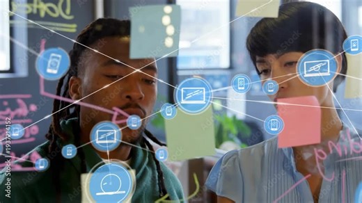 Team sorting notes on glass man adding note sparking growing blue network for business planning