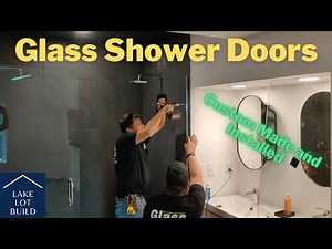 Installing our glass shower doors, 3/8 inch glass doors with panels!