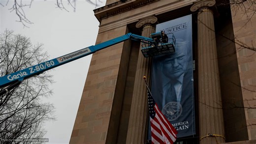 New Trump banner hung at Justice Department sparks backlash online