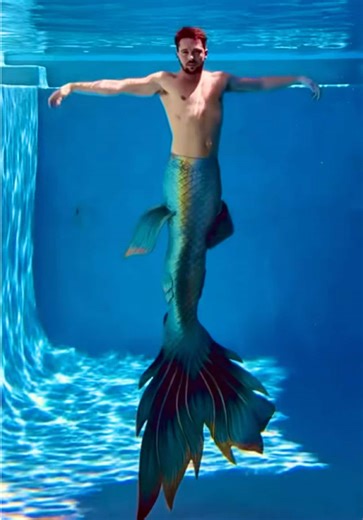 Slow motion. Salt water. No gravity… only temptation. 🫧 A merman in his element— gliding, posing, letting the ocean do the talking. 🐚 Watch the transitions. Feel the pull. Try not to stare too long. 😈 Depths made for desire 💙 Fantasy held underwater 🧜‍♂️ Blink and you’ll miss the magic ✨ @Finfolk Productions