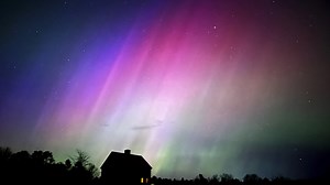 Solar storm hits Earth, producing colorful light shows across Northern Hemisphere