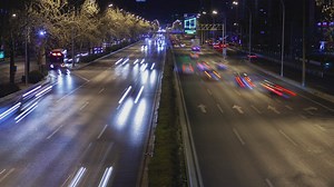 Fast traffic on a Beijing road at night - Free Stock Video