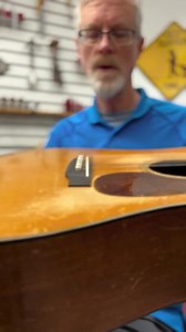 “That’s the beauty of the vintage guitar…” The top of this 1937 Martin D-18 has a dome-like shape, Joe Konkoly shows us how the torque of a new bridge and saddle will allow it to ring freely and sound its best. | Elderly Instruments