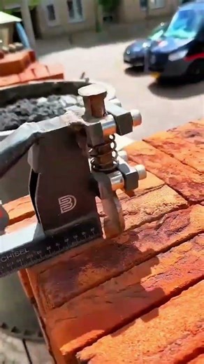 Brick cutting process shows accurate construction work technique