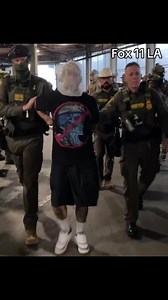 EXCLUSIVE: This man, wearing an anti-ICE shirt, was arrested by Border Patrol agents in downtown Los Angeles Tuesday. Matthew Munoz is accused of assaulting a federal law enforcement officer during an immigration operation last month. According to an arrest warrant, Munoz allegedly spit on an agent.Munoz is a U.S. Citizen and has been previously arrested more than a dozen times. | Matthew Seedorff
