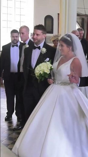 Bride walks down the aisle