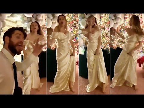 Miley Cyrus dances to 'Uptown Funk' in gorgeous wedding gown with husband