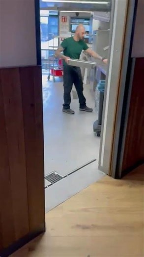 Magnetic levitation automatic pocket door from a German client, restaurant use foot sensor