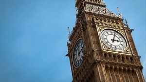 4K Time Lapse of Big Ben and moving Clouds During the Day with Copy Space: Capturing Daylight, Sunbeam Effects, and Iconic Architecture in London