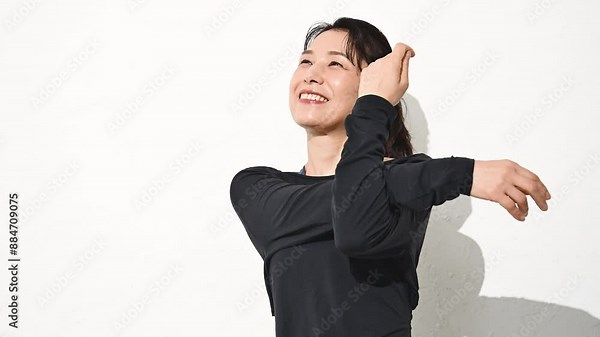 Video of a close-up of an upper body stretching of the image of a woman who values exercise and health.