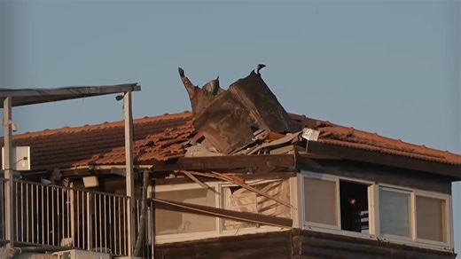 Shrapnel seen on roof in East Jerusalem from interception of Iranian missile