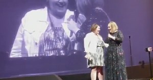 Local woman sings on stage with Adele