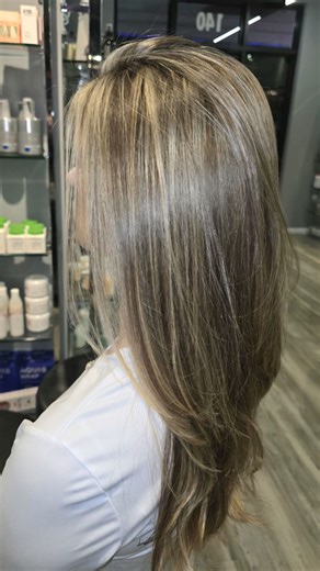 SALON NIRVANA 954 on Instagram: "💜 Soft light, seamless blend, healthy shine.💜⁠ ⁠ This partial highlight was finished with a custom gloss to enhance tone and reflect light without over processing. We paired it with a long layered haircut for movement and a polished blowout that lets the shape speak for itself.⁠ ⁠ This is how you brighten the hair while keeping integrity front and center.⁠ ⁠ If you’re looking for dimension that grows out beautifully, save this reel and DM us to book a complimen