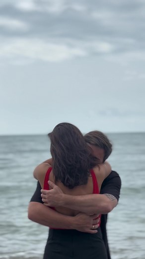 Romantic Beach Embrace: A Serene Moment by the Ocean