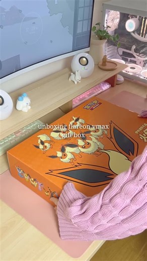 My ☘️ ミー on Instagram: "the way i was sat like this “🥹” throughout the entire opening of this beautiful flareon vmax gift box!! thank you @wearemaxgaming who sent this to me, and who also have the vaporeon and jolteon boxes available 🧡 #gifted 🧡 #pokemon #flareon #eeveelutions #pokemontcgcommunity #pokemoncards #pokémon #pokemonunboxing"