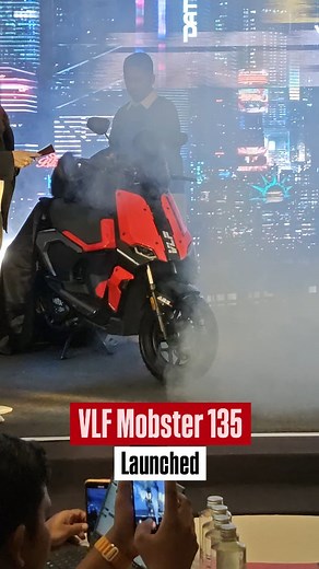 OVERDRIVE on Instagram: "VLF Mobster 135 has been launched in India at an introductory price of ₹1,29,999/- (Ex-showroom) for the first 2500 customers. -- Gets dual-channel switchable ABS, traction control, illuminated switchgear with full-LED lighting, dual gas-charged rear shock absorbers, and a 5-inch TFT display with Bluetooth connectivity. -- Equipped with keyless ignition, auto start/stop, and premium features that set new benchmarks for India’s scooter segment. Powering the scooter is a 1