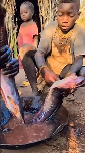 African families cooking a delicious traditional meal together. Fresh ingredient special. 🍲❤️