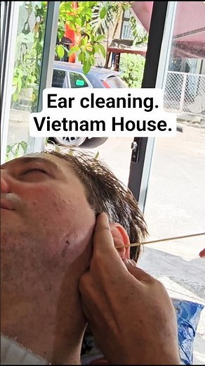 Ear cleaning at a Vietnamese house barber. #earcleaning #earwax #ears #ear #barber #barbershop
