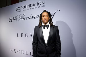 Jay-Z Poses For A Picture With Jermaine Dupri's Daughter Backstage