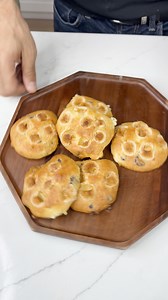 The best 4 ingredient cookies! I make cookies using no-bake cheesecake, cake mix, egg, and chocolate chips. This is a quick and easy dessert anyone will love! | The Midnight Chef