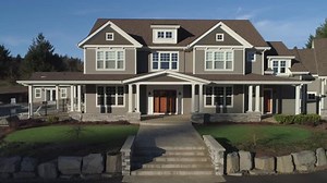 clip-34486822-beautiful-new-custom-home-camera-pulls-out