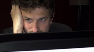 Man Working Late At Night Looking At Stock Footage SBV-302471168 - Storyblocks