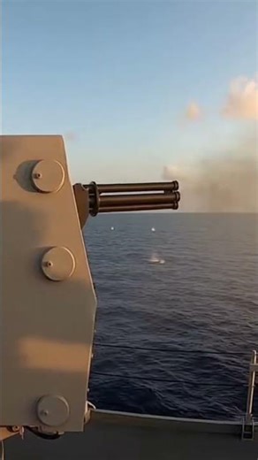 Cinematic 4K raw footage of a naval CIWS system conducting a safety demonstration firing