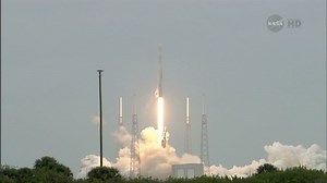 SpaceX rocket soars toward space station