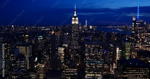 4K: New York City Skyline / Cityscape at Twilight. Amazing view of Manhattan, NYC, USA as night falls