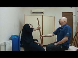 全力で握った棒を動かす