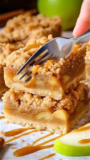 These Caramel Apple Pie Bars are like a warm hug from my childhood, filling the kitchen with that sweet, cinnamon-spiced aroma that makes you feel right at home. Trust me, one bite will have you reminiscing about those autumn days spent picking apples! Full recipe’s in the comment 👇 | Recipes & Cooking Guide
