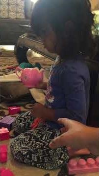 Baby Janci making a Duplo robot