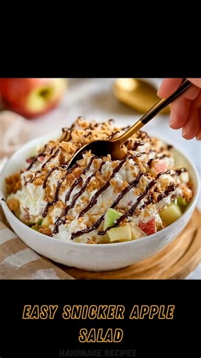 Handmake Recipes on Instagram: "🍎 Easy Snicker Apple Salad 🍫 12g Protein | g Creamy, crunchy, and irresistibly sweet, this no-bake Snicker apple salad combines crisp apples, fluffy creaminess, and chocolatey drizzle for the perfect easy dessert or potluck favorite everyone loves. 📝 Ingredients: 🍏🍫 ✦ 2 medium apples, diced 🍎 ✦ 1 cup vanilla Greek yogurt 🥣 ✦ ½ cup whipped topping 🥛 ✦ 2 Snickers bars, chopped 🍫 ✦ ¼ cup crushed graham crackers or cookies 🍪 ✦ 1 tbsp chocolate syrup 🍫 ✦ 1 t