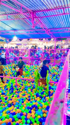 Have fun playing on the colorful ball pool slide