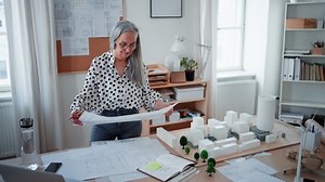 Senior Woman Architect Model Houses Looking Stock Footage Video (100% Royalty-free) 1097339951 | Shutterstock