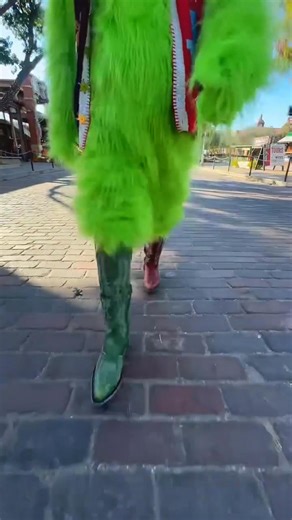New boots, new attitude. With a fresh pair from OldGringoStore, even the Grinch couldn’t resist a strut down E. Exchange Ave with a little holiday cheer in his step. 🎄 Swing by Stockyards Station to see what made his heart grow three sizes. 📷: OldGringoStore #stockyardsstation #oldgringoboots #westernwear #fortworthstockyards #shopfortworth #christmasinthestockyards #seefortworth | Fort Worth Stockyards Station