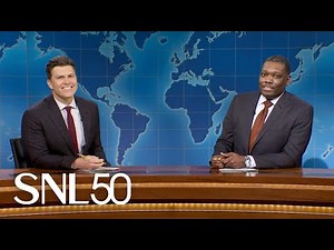 Michael Che 'Admits' to Jeffrey Epstein Friendship, Colin Jost Uses 'Black Voice' in Annual 'SNL' Joke Swap | Video
