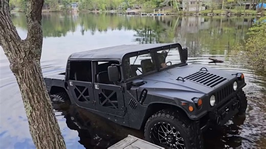 Epic tug of war showdown between a military Humvee and the Tesla Cybertruck