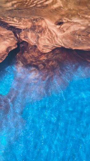 The deep resin channel flows like water between the towering Kauri pieces, capturing light and movement with every angle. This is more than a table, it’s a floating work of art. Crafted with precision, respect, and vision, designed to last a lifetime at sea.  Made in New Zealand 蝹 Material: Ancient Kauri + Blue Resin | Custom Kauri | Facebook